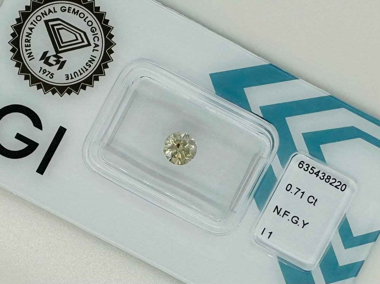 1 Stück Diamant (Natürlich farbig) - 0.71 ct - Rund - Fancy Grünlich Gelb - I1 - Mix und Mehr Shop