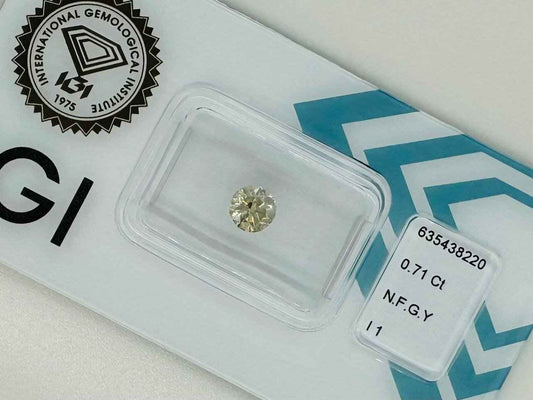 1 Stück Diamant (Natürlich farbig) - 0.71 ct - Rund - Fancy Grünlich Gelb - I1 - Mix und Mehr Shop