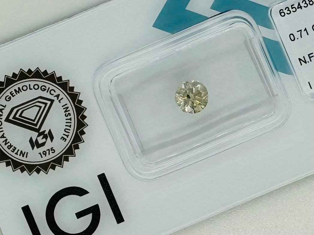 1 Stück Diamant (Natürlich farbig) - 0.71 ct - Rund - Fancy Grünlich Gelb - I1 - Mix und Mehr Shop